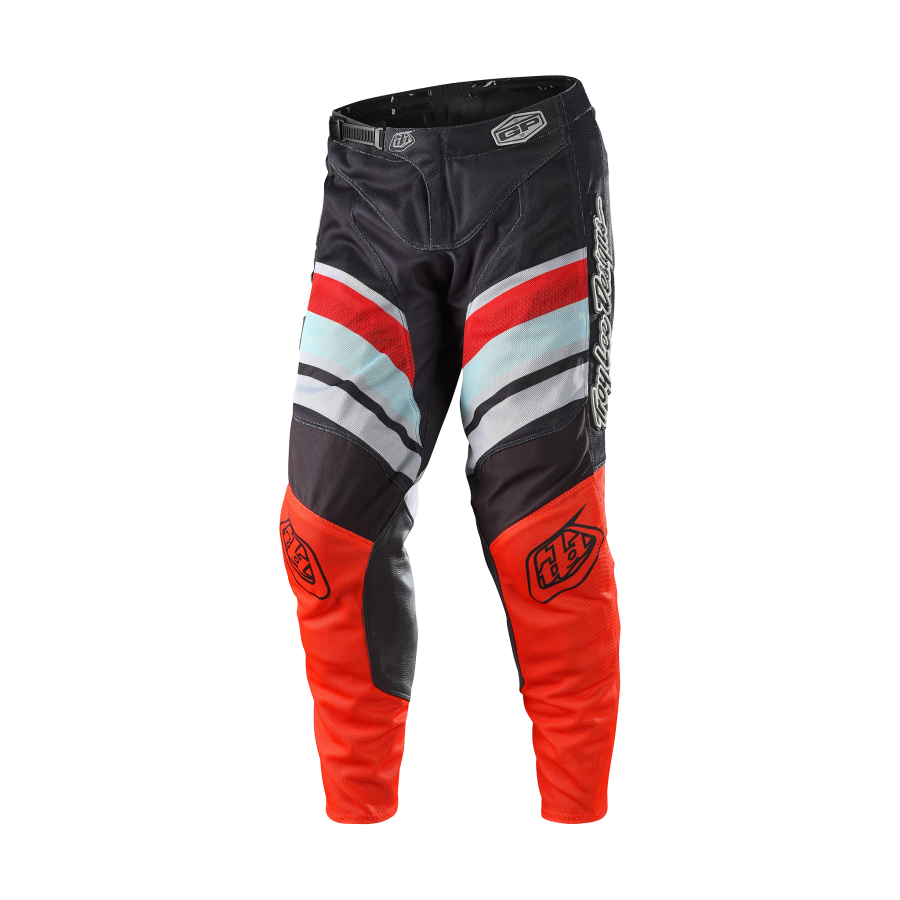 troy-lee-designs-crossbroek-gp-air-warped-charcoal-oranje-1.png