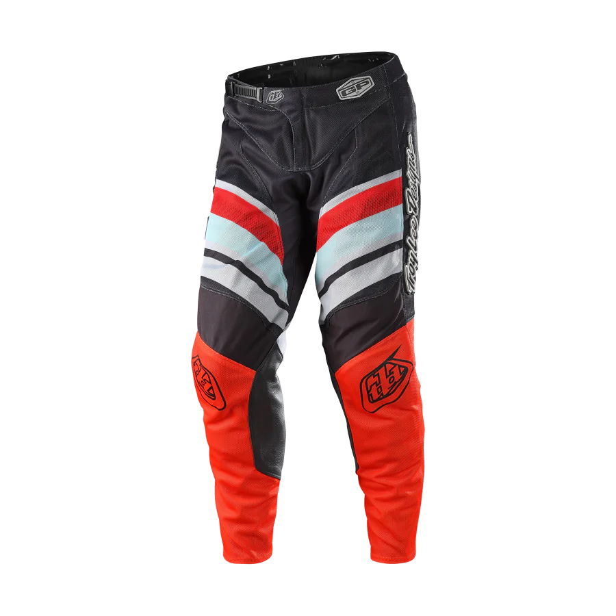 troy-lee-designs-crossbroek-gp-air-warped-charcoal-oranje-1.png